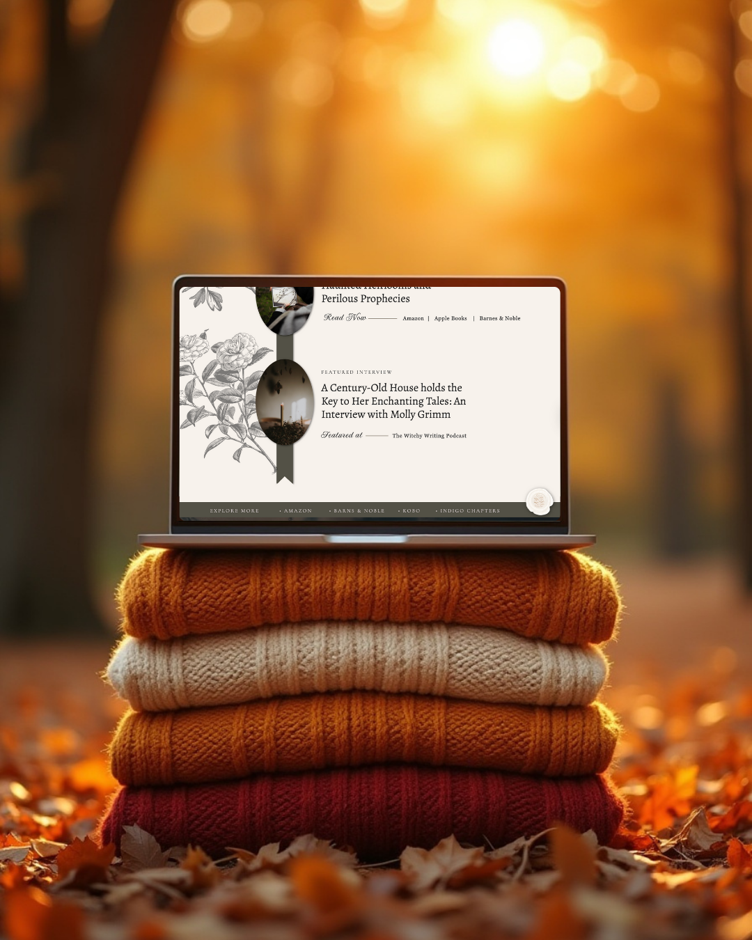 Laptop mockup of gothic author website template on stack of autumn sweaters surrounded by leaves.
